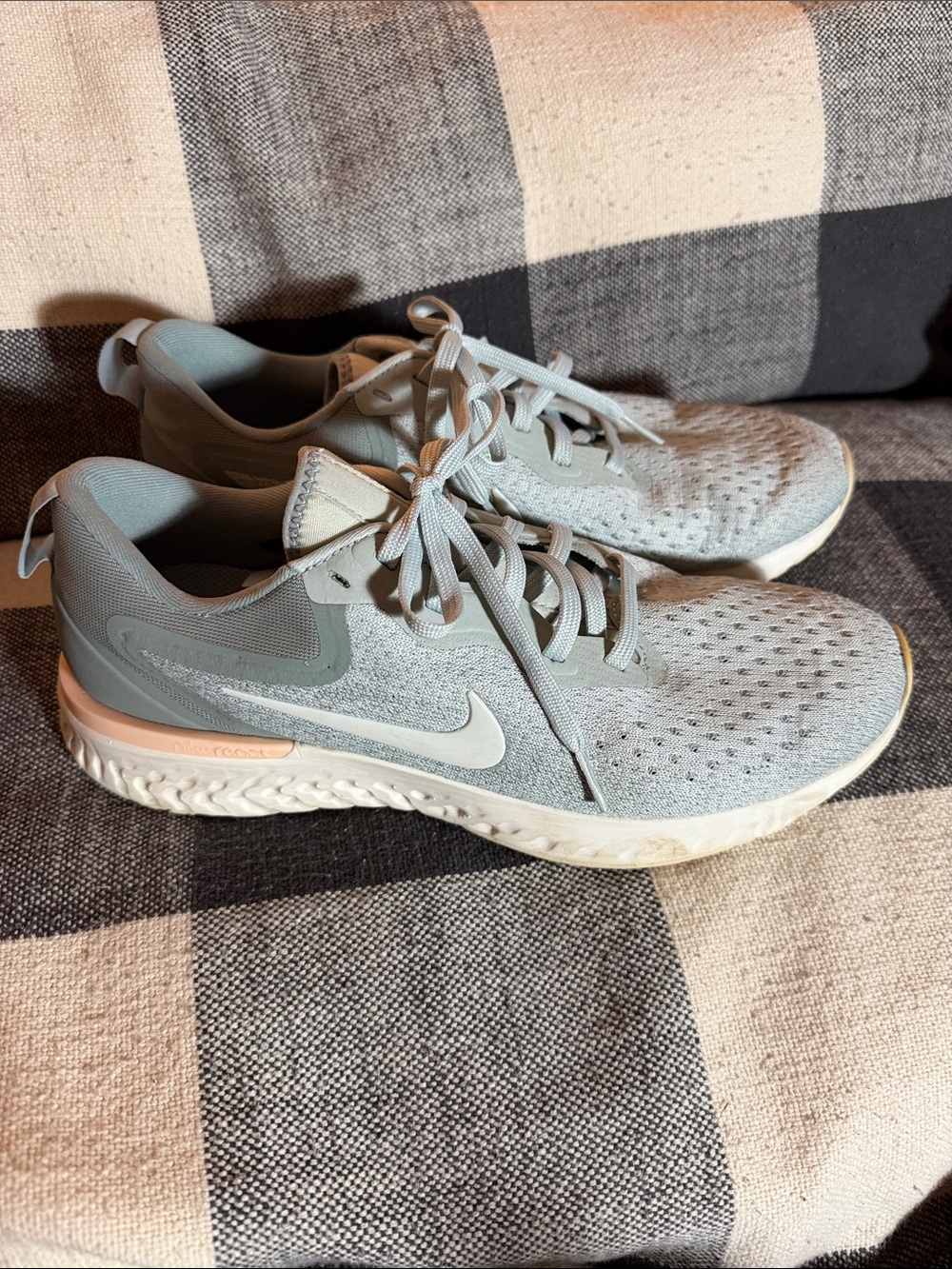 Nike Women's Light Gray Athletic Running Shoes with Pale Pink Accent